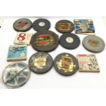 A quantity of vintage 8mm film reels to include a Pathe Coronation reel, Mickey Mouse and Laurel &