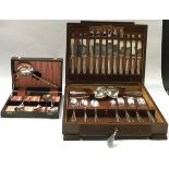 Hugh Foulerton stainless steel cutlery set for six in wooden canteen together with a smaller boxed