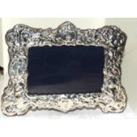 A silver easel back picture frame.