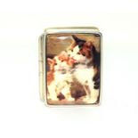 A silver lidded pill box with enamel panel depicting cats.