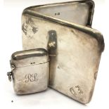 Silver H/M cigarette case and a similar vesta case
