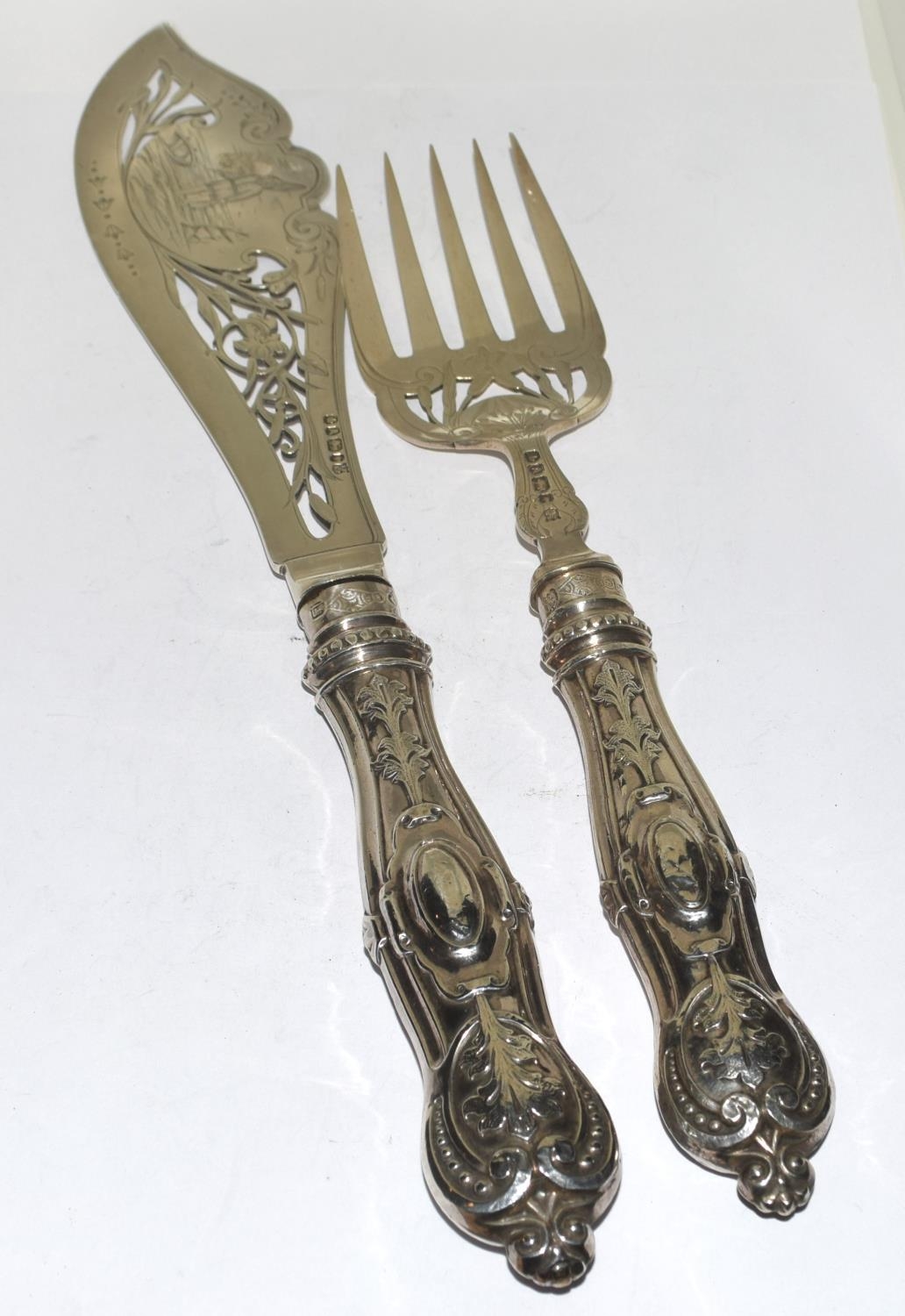 Pair of highly decorated Victorian Fish servers showing images for fishermen and boats etc Sheffield