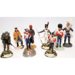 A collection of hand painted cast metal military figures to include examples by Charles Stadden