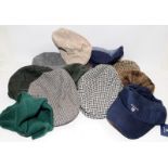 A quantity of flat caps and baseball hats