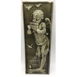 Craven Dunnll large relief moulded tile depicting angel playing pan flutes 6" x 16.25" (some