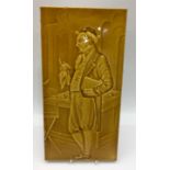 Large relief moulded tile depicting a Gentleman with book c1900, 6" x 12"