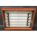 Glass fronted display case with 5 glass shelves. 61 x 46 x 11cms.