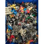 Collection of plastic Warhammer figures.