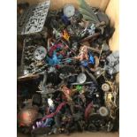 Collection of plastic Warhammer figures.