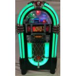 ITEK JUKEBOX. A very loud machine with CD, Bluetooth, AM/FM radio. The unit changes colour and sizes