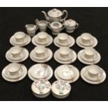 H.P. Teaset for 10 with extras together with two Poole Pottery lidded pots.