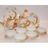Extensive Oriental mid century export china tea service featuring gilded dragons and Lithophane