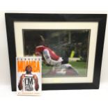 Arsenal signed and authenticated picture of "Emmanuel Adebayor "and a signed "Fabrice Muamba " book