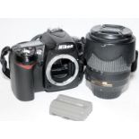 Nikon D90 DSLR camera c/w AF-S Nikkor 18-105mm zoom lens and battery. No battery charger so being