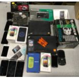 A carton of mobile phones and other electrical items, mostly boxed (WP99)