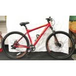 A Carrera red Hellcat mountain bike. 50cm frame size 62cm wheel size 24 gears (72)