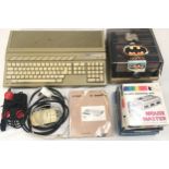 Vintage home computing, Atari 520ST c/w mouse, user guide and a number of boxed games and floppy