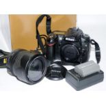 Boxed Nikon D90 DSLR camera c/w Nikon DX AFS-Nikkor 18-105mm 1:3.5-5.6 zoom lens and battery with