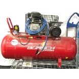 A red air compressor. (H48)