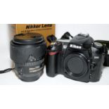 Nikon D90 DSLR camera body c/w boxed Nikkor AF-S 18-135mm zoom lens. No battery so being sold