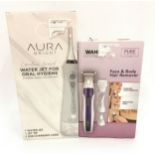 Aura Bright Cordless Water Jet for Oral Hygiene together with Wahl Face and Body Hair Remover.