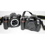 2 x Nikon DSLR camera bodies, D70 and a D90, no batteries sold untested (41)