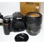 Nikon D90 DSLR camera body c/w boxed Nikkor AF-S 18-105mm zoom lens. No battery so being sold