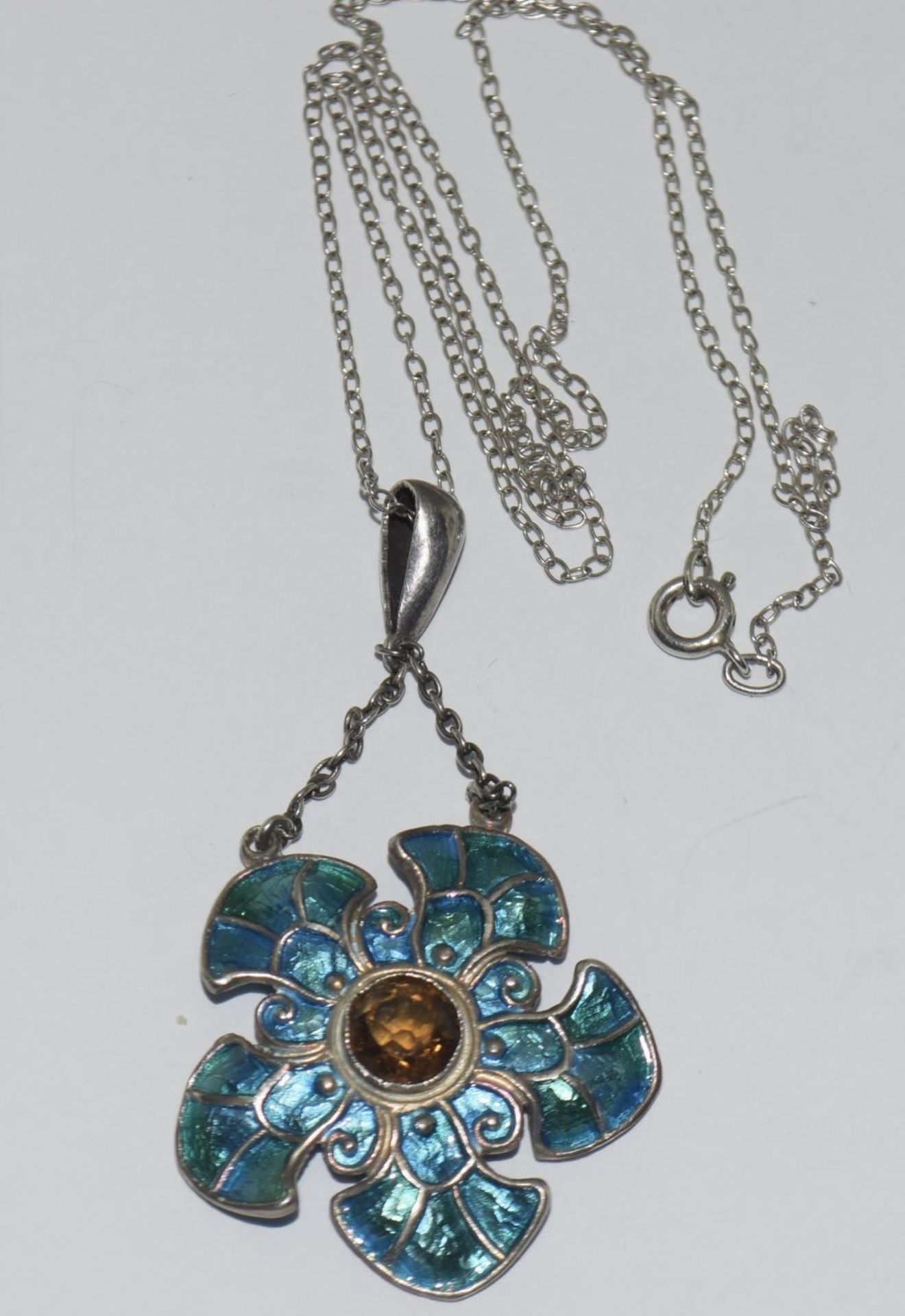 Art Nouveau Liberty style silver and enamel pendant with citrine on silver chain, boxed.