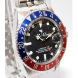 Rolex GMT Master model 1675 (serial number worn can make out some numbers) on Rolex service cards,