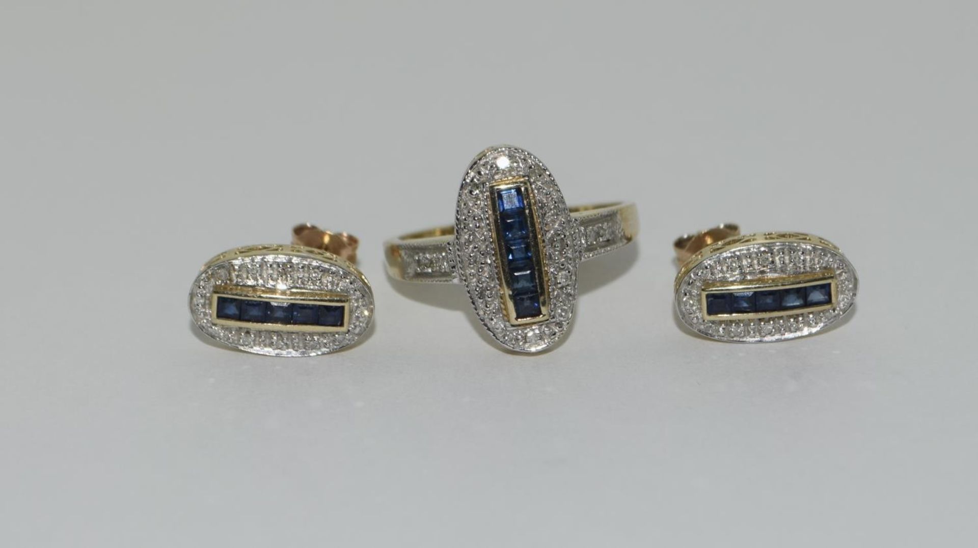 9ct gold Diamond and Sapphire suite of ladies jewellery consisting of Ring size N and matching