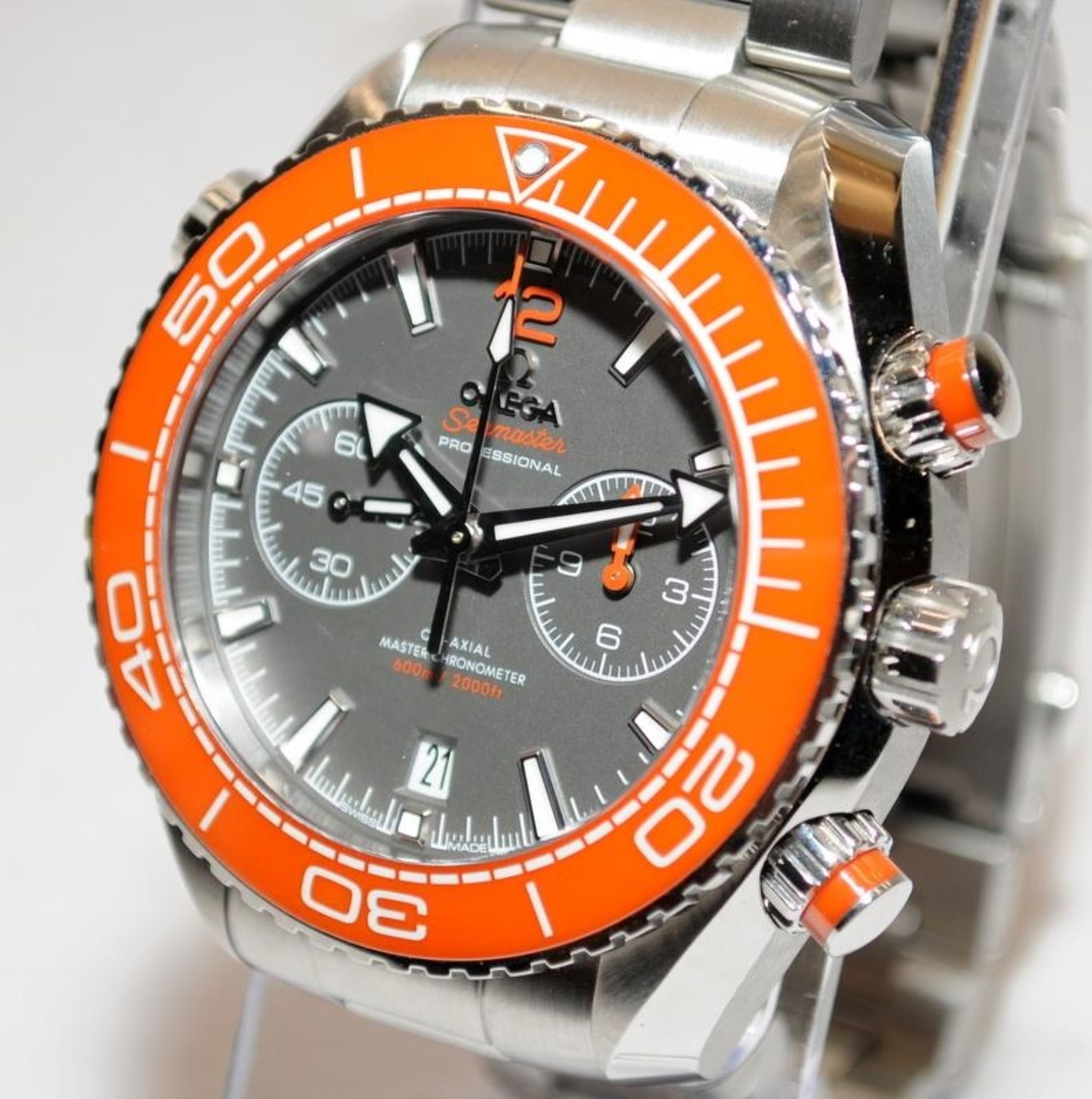 Omega Seamaster Planet Ocean, grey dial/orange bezel variant. Comes complete with papers, inner