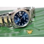 Rolex Oyster Perpetual Date, blue dial, stainless steel bracelet, model ref 115210. Full set.