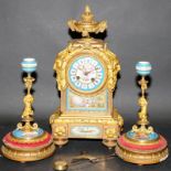 Antique ormolu striking mantel clock with painted porcelain panels c/w ornate candlestick garniture.