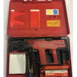 Hilti DX 450 cartridge gun in case.