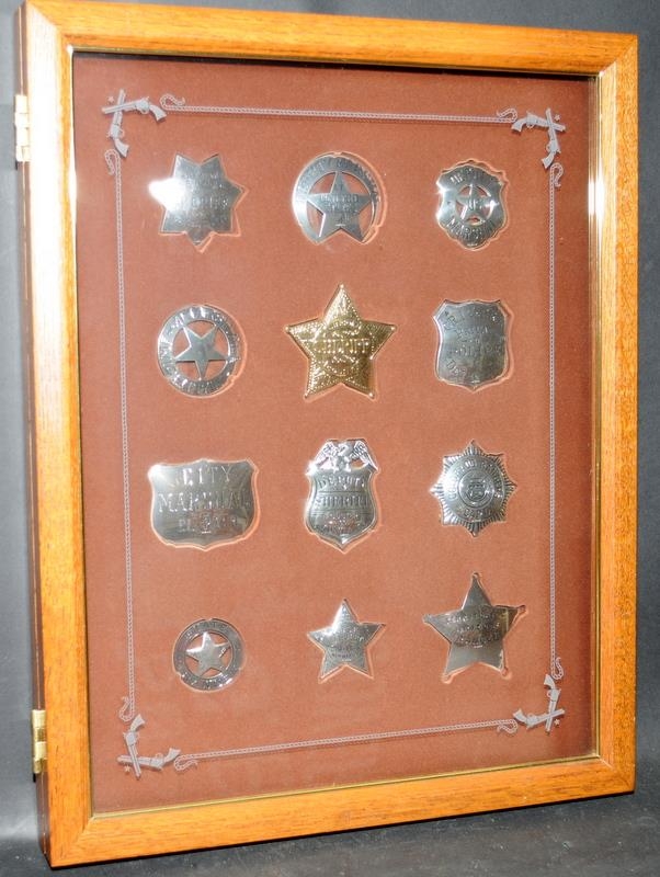 Sterling silver Lawman Badge Collection by Franklin Mint. Complete set of twelve badges in a bespoke