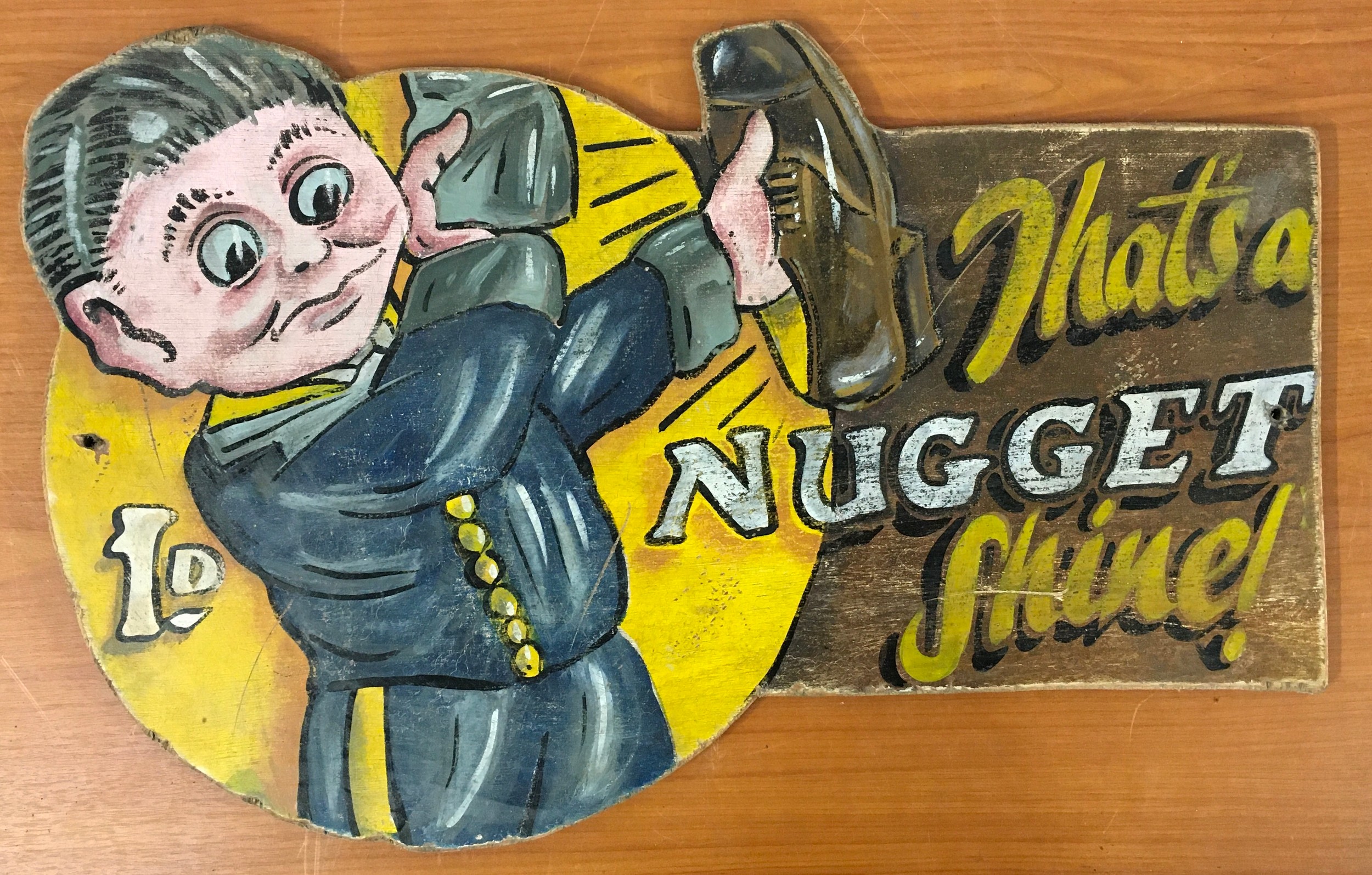 A wooden amusement arcade sign 1d nugget, reproduction.