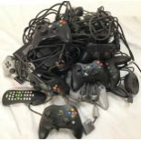 Collection of Playstation and XBOX controllers, power supplies and other leads.