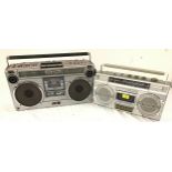 Two Sharp vintage cassette boom boxes.