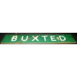 Very large enamel railway station platform sign 'Buxted' on wooden frame. 245cms x 43cms