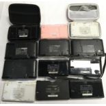 Collection of Nintendo DS and DS Lite consoles.