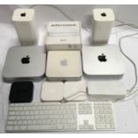 Collection of Apple products to include Mac mini, AirPort Extreme etc.