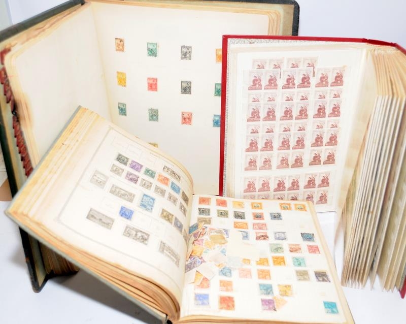 Three large stamp albums including The Ideal Postage Stamp Album Part II: Foreign Countries with a