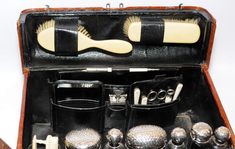 A Moynat of Paris "Croco de Voyage" 1910 a gentlemans travelling fitted vanity case in brown - Image 4 of 9