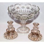 Early C20 large cut glass pedestal dish 27cm diameter together with a pair of vine engraved glass