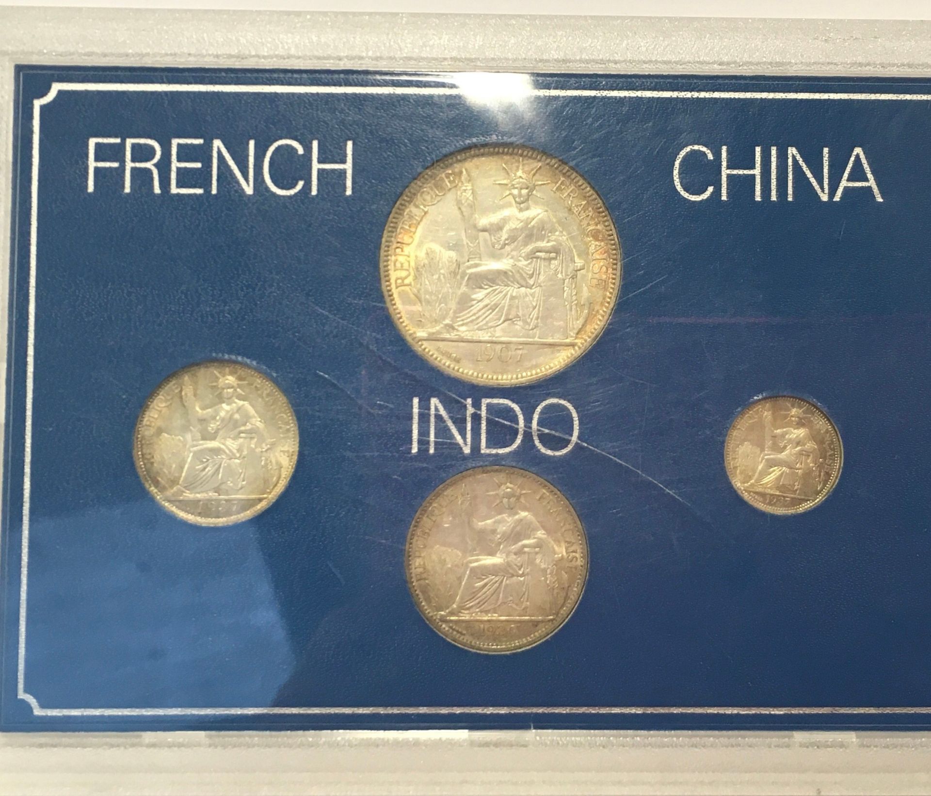 French Indo China 1907 piagtre, 1936 50 cents, 1937 20 cents, and 1937 10 cents. 4 coin set.