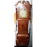 Superb quality antique long case striking clock with flame mahogany case, original hand blown