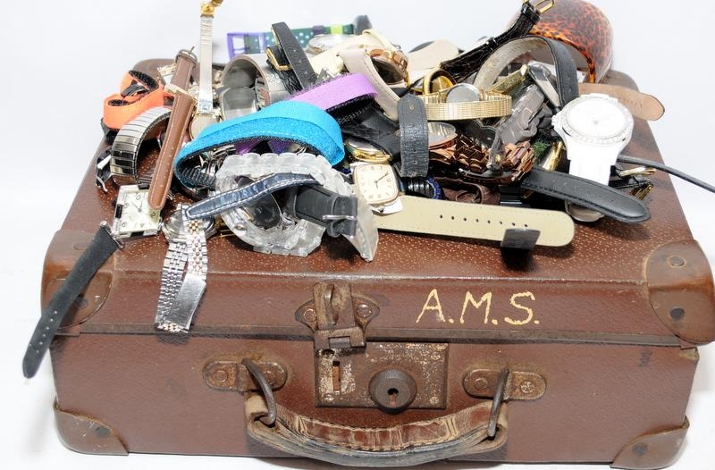 Small case containing a quantity of ladies fashion watches to include a Tudor quartz