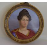 Round gilt frame miniature on porcelain of a possible roman lady
