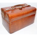 A Moynat of Paris "Croco de Voyage" 1910 a gentlemans travelling fitted vanity case in brown