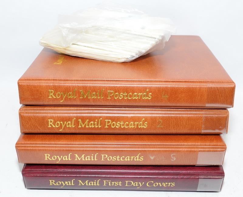 Three albums of Royal Mail postcards, a further album of First Day Covers and a collection of